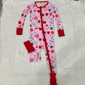 Little Sleepies. 18-24 month zippy. Pink and red hearts and candy print.